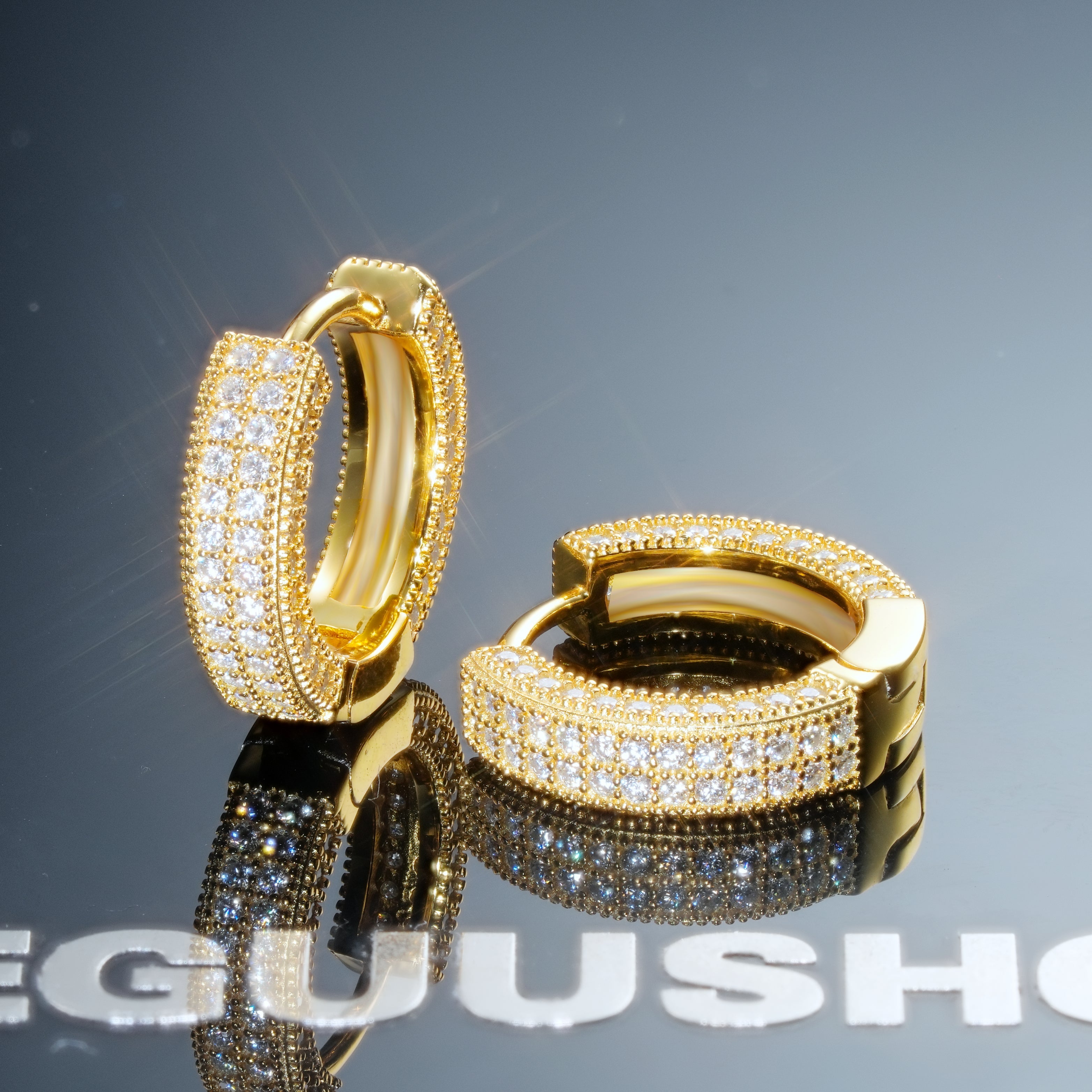 925s VVS1 Moissanite Fully Iced 3D Hoop Earrings In 18k Gold